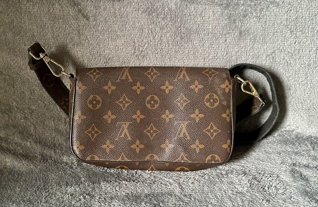 Louis Vuitton Monogram Canvas Crossbody Bag (Category: Luxury Bags & Wallets) located in Candaba. Submitted by shokgold19 (Listing ID 1460508460, Image 2). Description: - Classic Louis Vuitton monogram canvas crossbody bag - Secure flap closure with button snap - Vibrant pink fabric interior lining - Detachable and adjustable strap for versatile wear - Ideal for everyday use or travel.