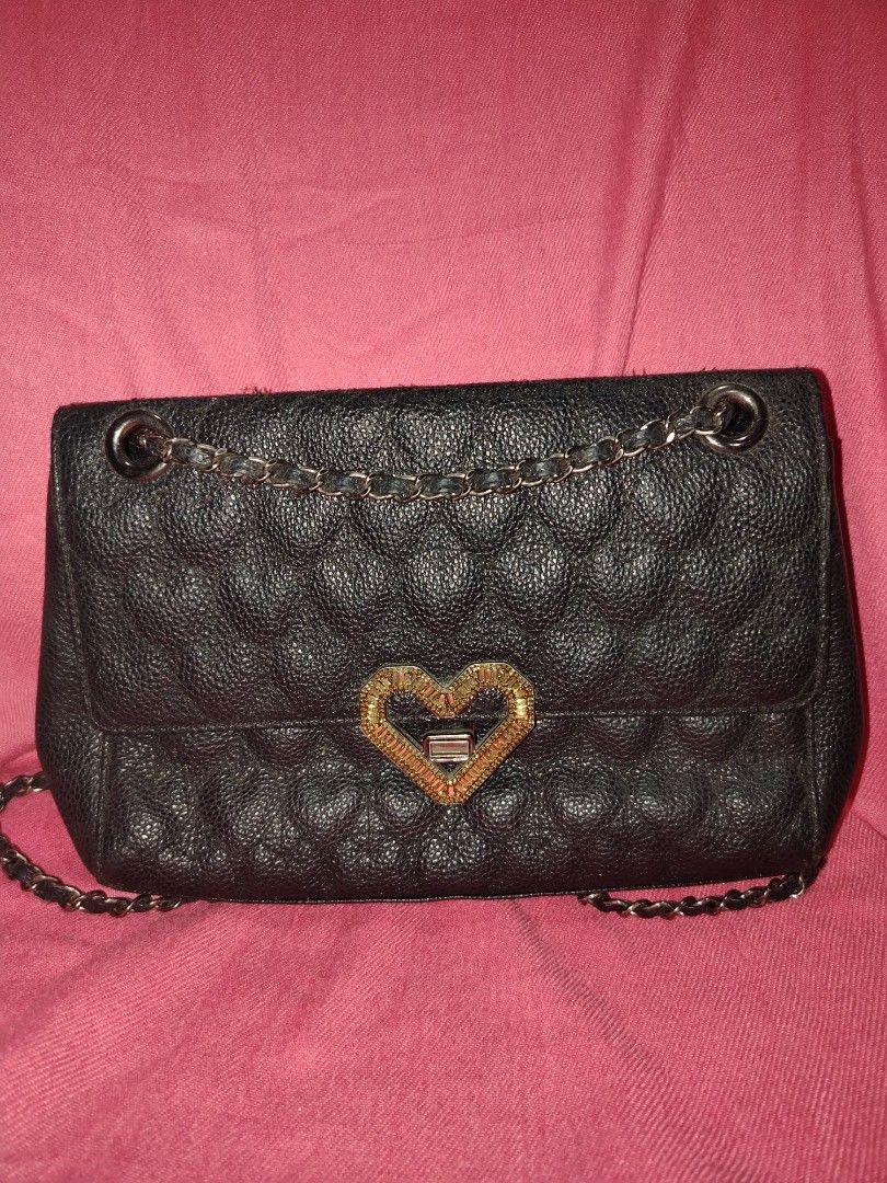 Love cat (Category: Cross-body Bags) located in Tagum. Submitted by mjprelovedbags2020 (Listing ID 1460508965, Image 1). Description: Orig love cat caviar leather super ganda no issue po kasya long wallet.