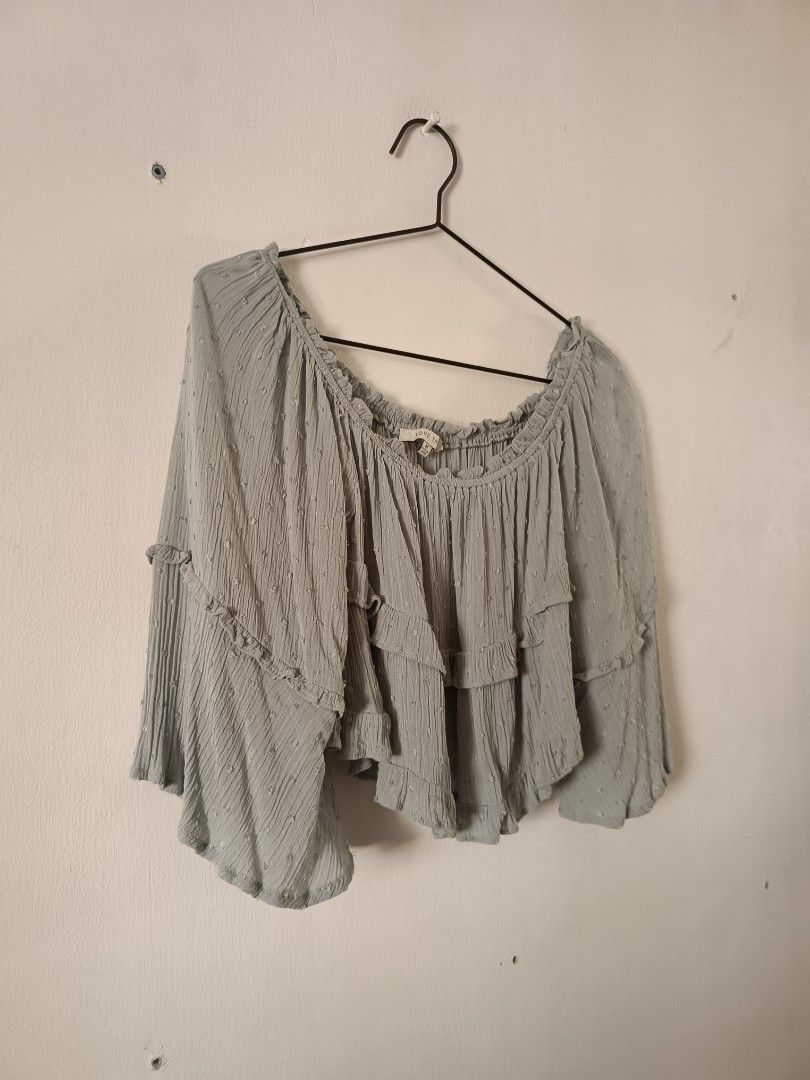 Love Tree Light Blue Off-Shoulder Ruffle Crop Top (Category: Others Tops) located in Manila. Submitted by shajanina.14 (Listing ID 1460552856, Image 2). Description: Love Tree Preloved As good as new Medium on tag As per measuring tape, Bust- up to 42 inches Waist- up to 54 inches Length- 15 inches .