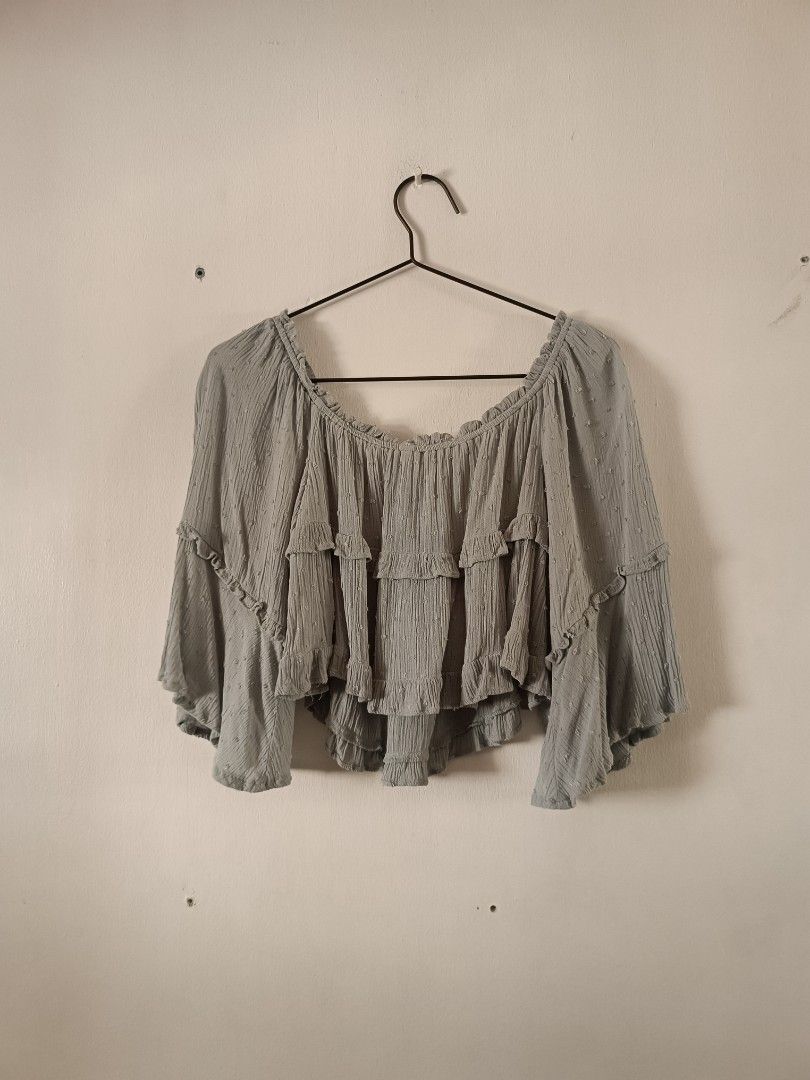 Love Tree Light Blue Off-Shoulder Ruffle Crop Top (Category: Others Tops) located in Manila. Submitted by shajanina.14 (Listing ID 1460552856, Image 3). Description: Love Tree Preloved As good as new Medium on tag As per measuring tape, Bust- up to 42 inches Waist- up to 54 inches Length- 15 inches .