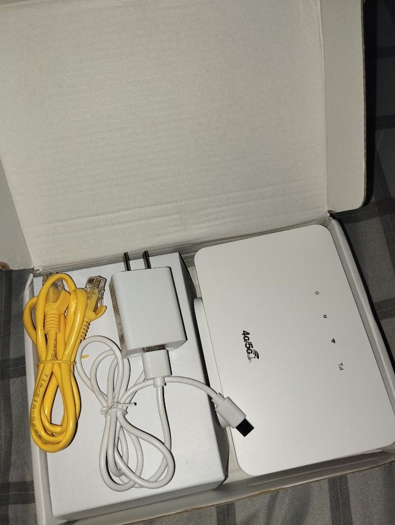LTE CPE 300 Router with Power Adapter and LAN Cable (Category: Networking) located in Naga. Submitted by justcallmerain (Listing ID 1460509186, Image 2). Description: - LTE CPE 300 Router - Includes power adapter and yellow LAN cable - Original box included - Ideal for home or office internet setup - Easy to connect and use - Ensures a reliable internet connection for back up - Open to all network .