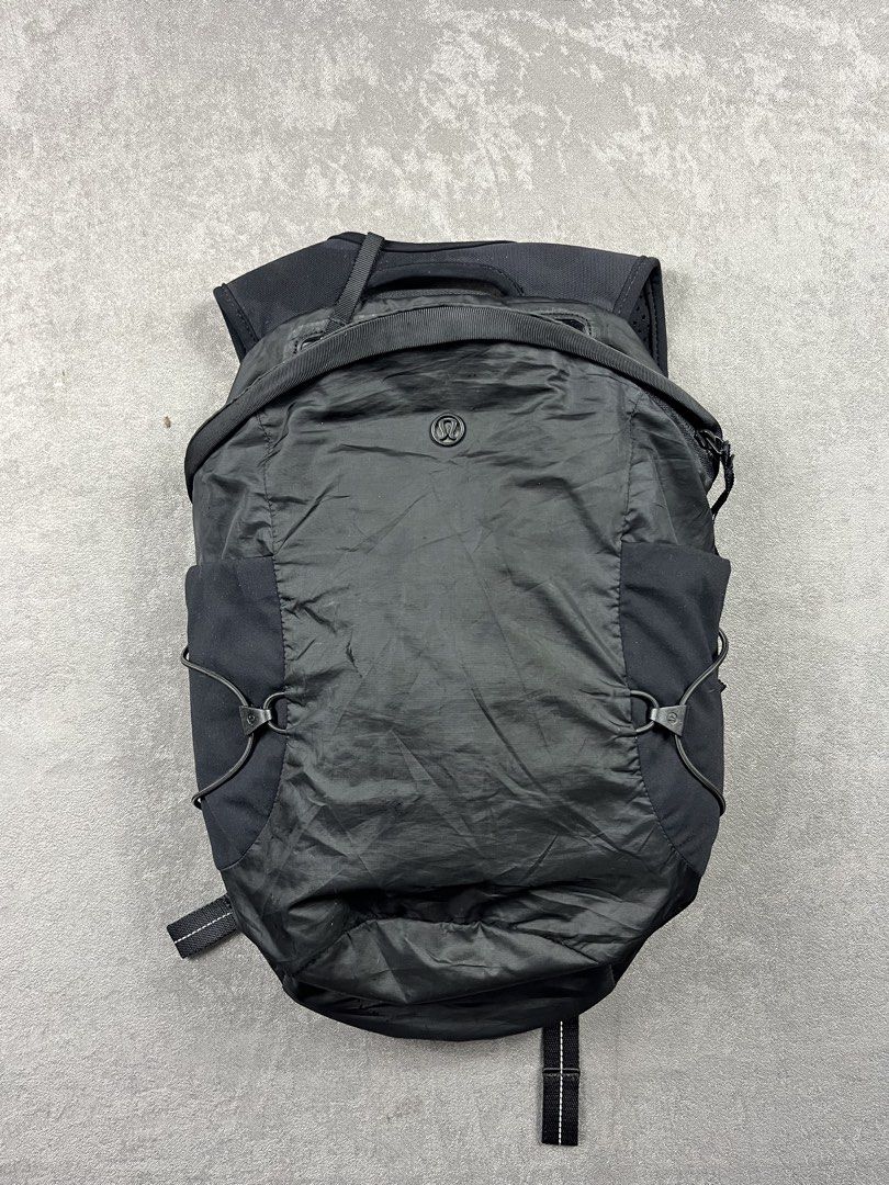Lululemon Run All Day Backpack 13L (Category: Backpacks) located in Manila. Submitted by homegrwn_thrift (Listing ID 1460635020, Image 1). Description: - Brand: Lululemon - Color: Black - Designed in: Vancouver - Made in: Vietnam - Material: 100% Polyester (Body & Lining), 77% Nylon & 23% Elastane (Contrast) - Features: Adjustable straps, multiple pockets - Ideal for: Everyday use, workouts, gym.