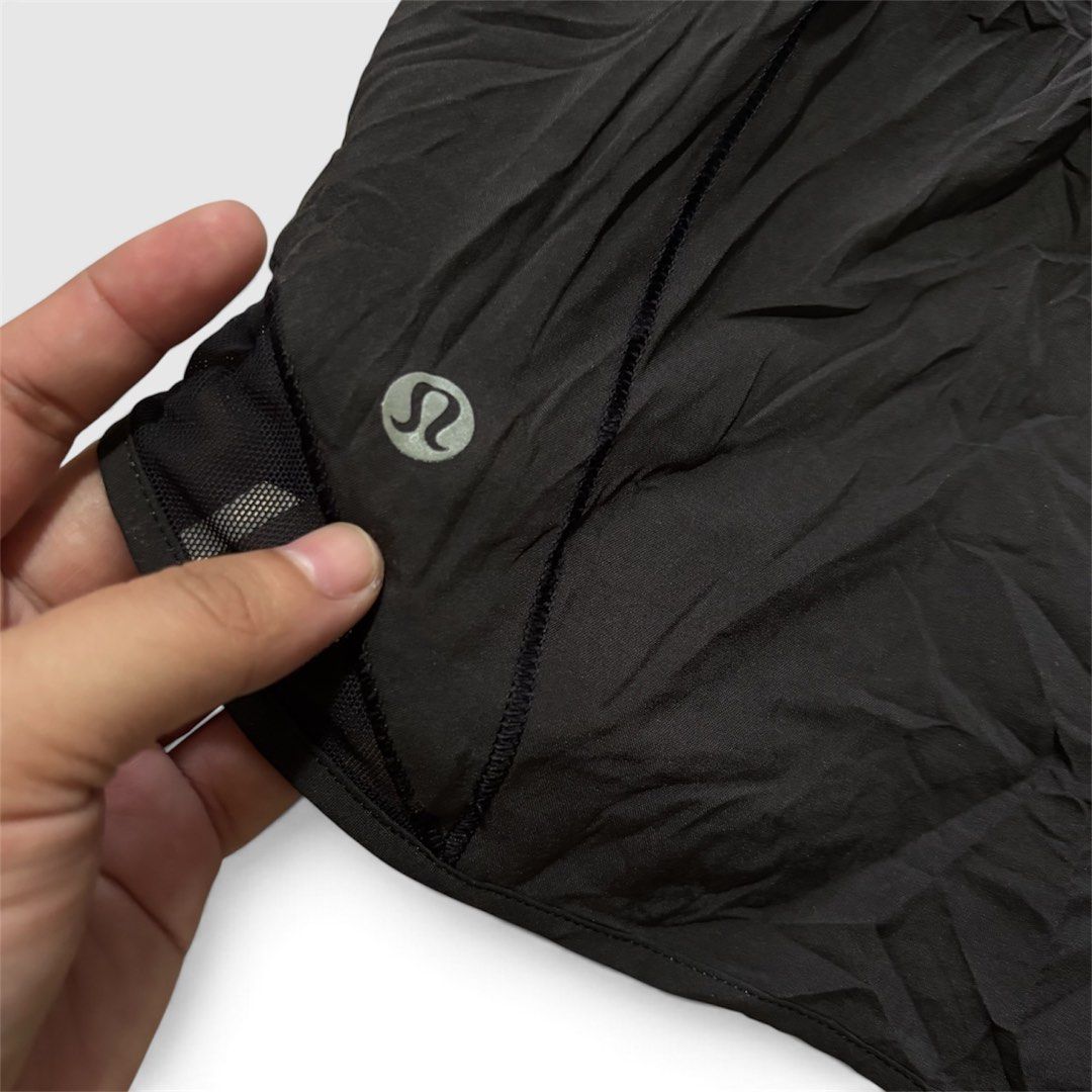 Lululemon Black Running Shorts Size 8 (Category: Activewear) located in Malilipot. Submitted by brevsthrift (Listing ID 1460548194, Image 3). Description: - Brand: Lululemon - Color: Black - Size: 8 - Features: Elastic waistband with drawstring, side zipper pocket, mesh detailing on sides and hem - Ideal for: Workouts and running Plus sf.