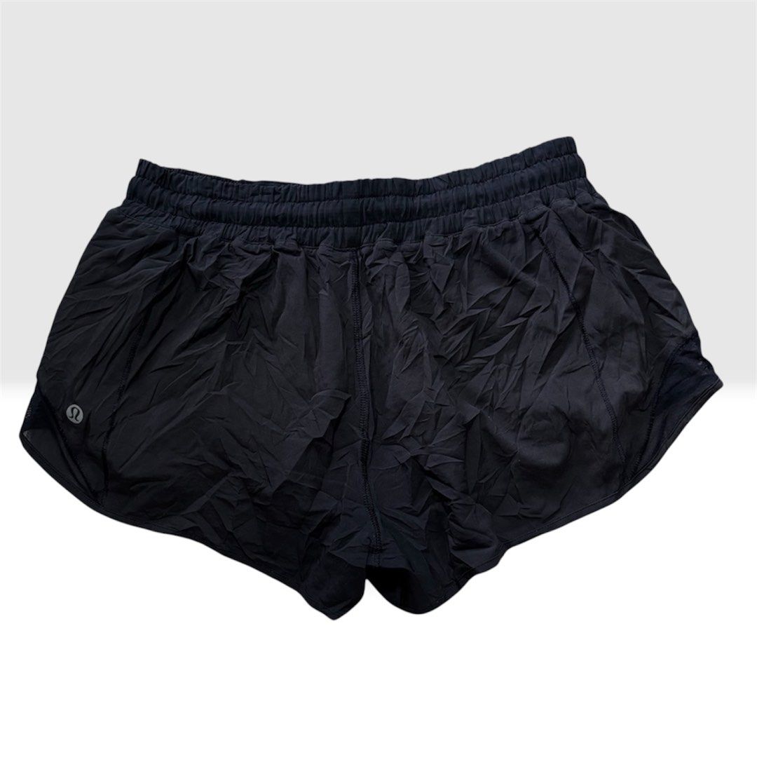 Lululemon Black Running Shorts Size 8 (Category: Activewear) located in Malilipot. Submitted by brevsthrift (Listing ID 1460548194, Image 2). Description: - Brand: Lululemon - Color: Black - Size: 8 - Features: Elastic waistband with drawstring, side zipper pocket, mesh detailing on sides and hem - Ideal for: Workouts and running Plus sf.