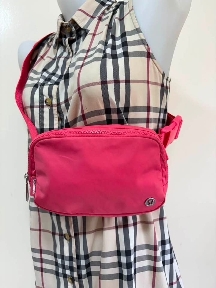 Lululemon Everywhere Belt Bag Pink (Category: Cross-body Bags) located in Manila. Submitted by ukaygandamo (Listing ID 1460650392, Image 2). Description: - Pink Lululemon Everywhere Belt Bag - Adjustable strap - Zipper closure - Small logo detail - Ideal for everyday use and workouts - Fits phone, keys, and wallet - Versatile wear: crossbody or waist.