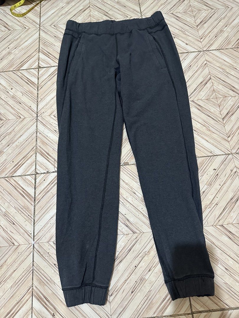 Lululemon Grey Jogger Pants Size 6 (Category: Other Bottoms) located in Angeles City. Submitted by alejeong27 (Listing ID 1460637716, Image 1). Description: - Grey Lululemon joggers - Size 6 - Elastic waistband with drawstring - Two side pockets - Cuffed ankles - Lululemon logo on left leg - Ideal for lounging or workouts.