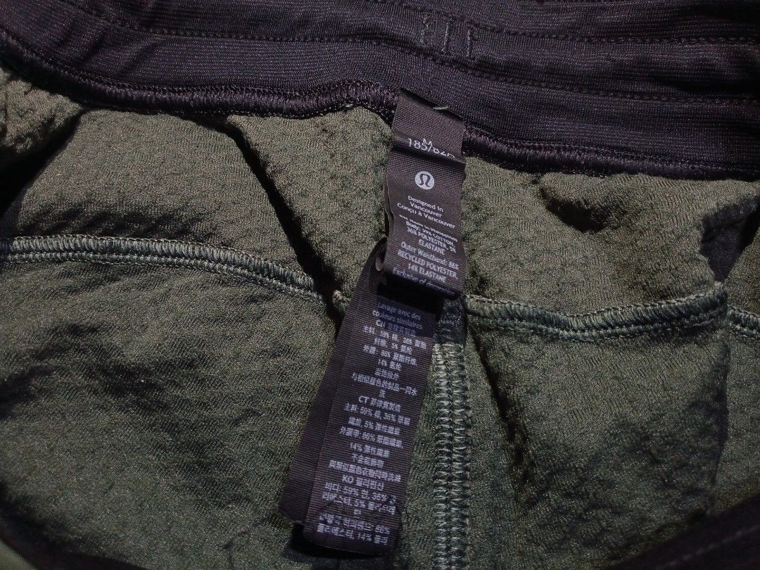 Lululemon Textured Shorts Green (Category: Shorts) located in Boston. Submitted by johnpaulvi30029 (Listing ID 1460649667, Image 3). Description: - Lululemon green textured shorts - Elastic waistband with drawstring - Two side pockets - Lululemon logo on left leg - Made with recycled polyester and elastane - Ideal for workouts or lounging.