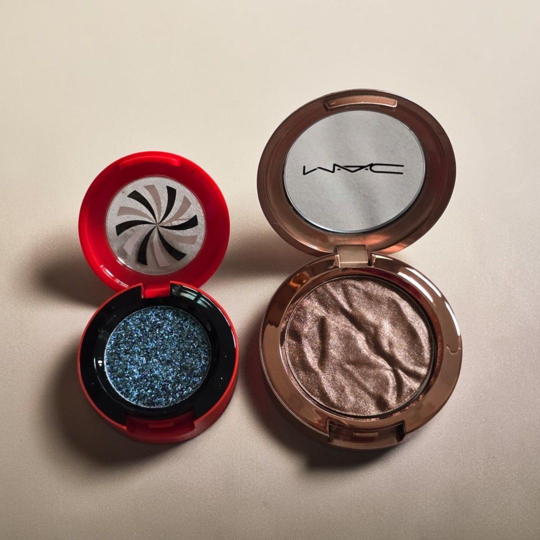 MAC Cosmetics Single Eyeshadow (Category: Makeup) located in Taguig. Submitted by altainfante (Listing ID 1460683578, Image 1). Description: ​MAC Shadeshifter Duochrome Eye Shadow – Prrrplexing! ​Finish: High-sparkle, multidimensional duochrome. ​Shade: Deep blue-teal shift with iridescent glitter particles. ​Packaging: Collector's holiday-edition red compact with a optical-illusion swirl mirror design. ​Net Weight: 1 g / 0.03 oz Php 380 ​MAC Foi