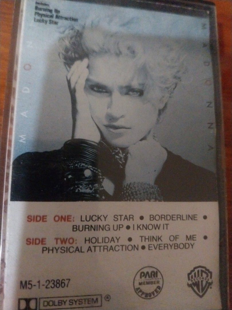 Madonna - Madonna (Cassette Tape) (Category: CDs & DVDs) located in Paranaque City. Submitted by riccsmars (Listing ID 1460524384, Image 1). Description: - Madonna's self-titled debut album on cassette - Features hit songs: Lucky Star, Borderline, Holiday, Everybody - Enhanced sound with Dolby System - Perfect for Madonna collectors.