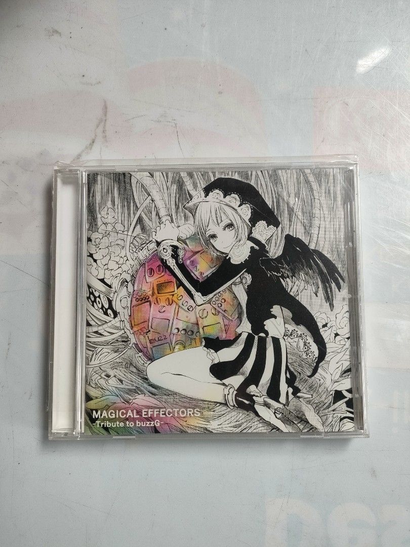 MAGICAL EFFECTORS Tribute to buzzG CD (Category: CDs & DVDs) located in Manila. Submitted by kimpot0801 (Listing ID 1460513120, Image 1). Description: - MAGICAL EFFECTORS CD - Tribute album to buzzG - Features 12 tracks - Includes popular songs like "Albino", "Dance Floor", and "Fairytale" - Unique artwork by a distinctive artist - Released in 2013 - Ideal for fans of buzzG or this music compilation.