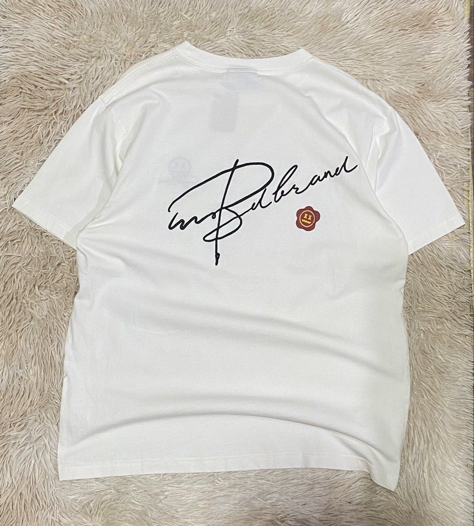 Make Best Design® (MBD) Script Back Graphic Tee - Pure White Embroidered Design💫 (Category: Tshirts & Polo Shirts ) located in Puerto Princesa. Submitted by thriftedheatshub (Listing ID 1460633428, Image 1). Description: DESCRIPTION: 📌 🔥 MAKE BEST DESIGN® SCRIPT BACK GRAPHIC TEE! Clean asian streetwear piece featuring a sleek signature script and stamp back print with a minimalist plain front layout. Premium thick neck ribbing and soft cotton 