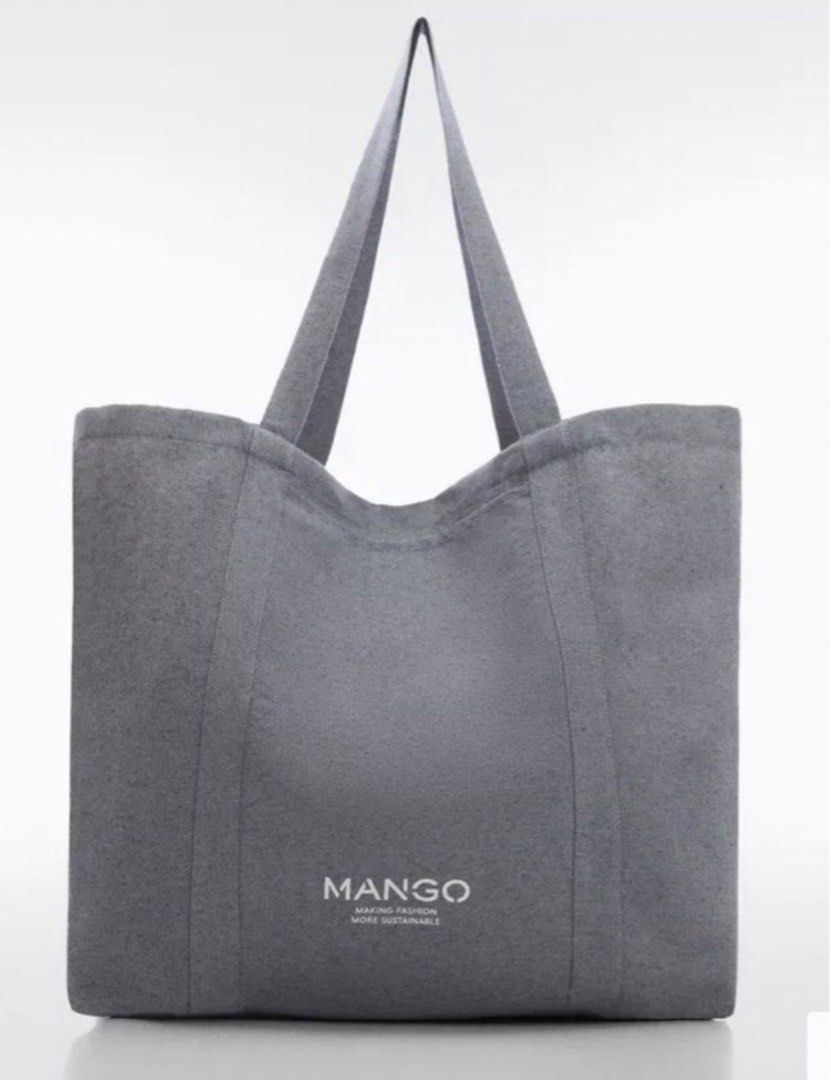 MANGO Packaway Grey Canvas Tote Bag (Category: Tote Bags) located in Calapan. Submitted by shakalak (Listing ID 1460513576, Image 3). Description: - Mango grey canvas tote bag - Features printed Mango logo on the front - Simple and spacious design - Made from sturdy canvas or denim blend material - Comes with two comfortable shoulder straps - Ideal for everyday use or shopping trips -From Belgium .