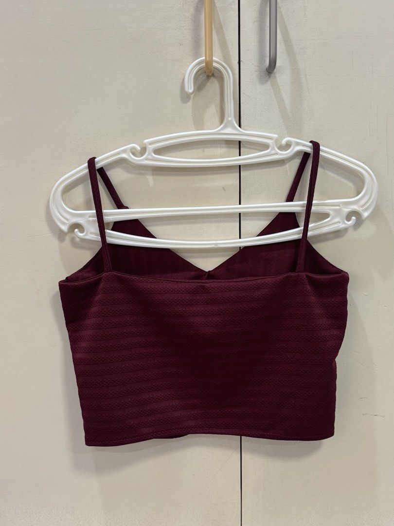 Maroon V-Neck Spaghetti Strap Cropped Top (Category: Sleeveless) located in Manila. Submitted by itsandreaco (Listing ID 1460565293, Image 2). Description: - Product measurements: Bust 31 inches / Length 15 inches (including strap) - Maroon cropped top - V-neckline spaghetti strap.