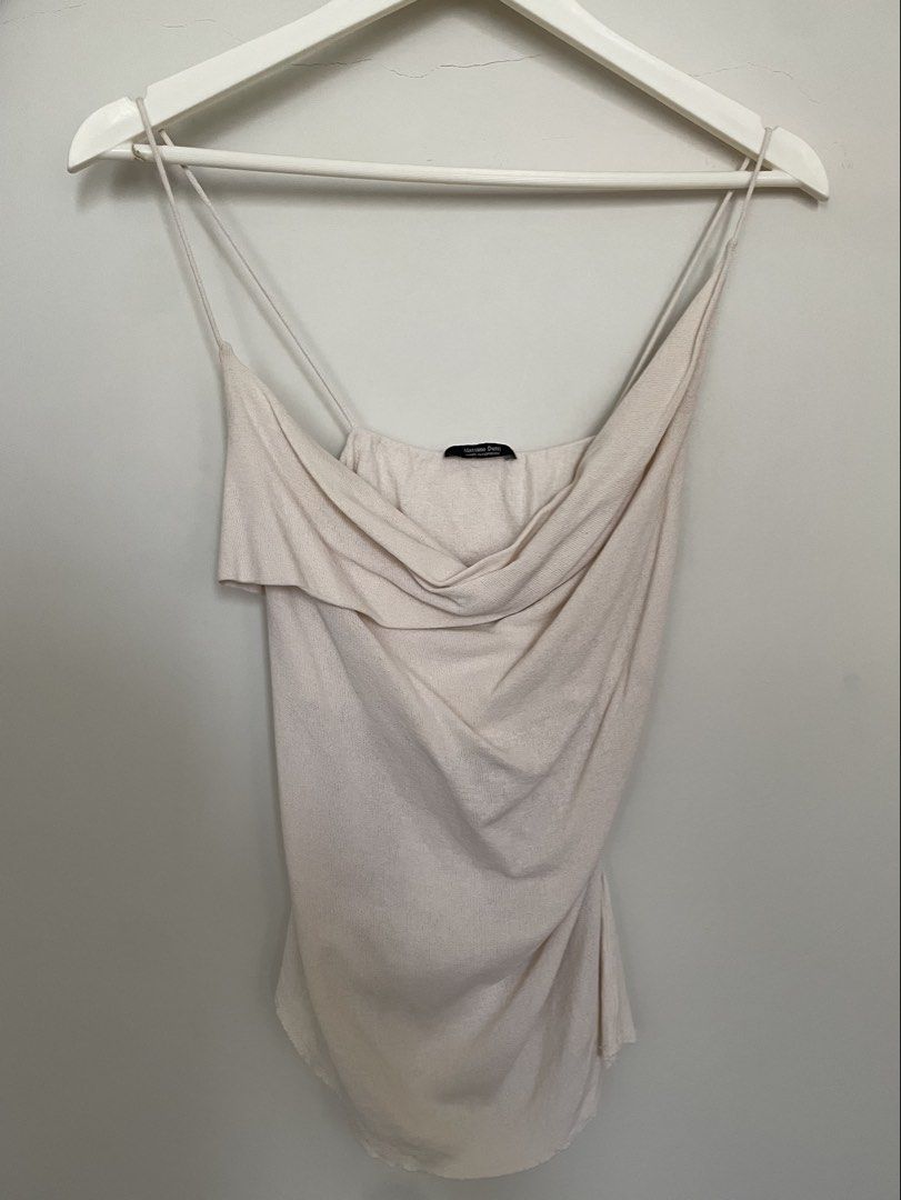 Massimo Dutti Cream Cowl Neck Spaghetti Strap Top (Category: Sleeveless) located in Makati City. Submitted by alyslittlelamb (Listing ID 1460670621, Image 3). Description: - Elegant cream cowl neck top - Delicate spaghetti straps - Lightweight and flowy material - Beautifully drapes for a flattering fit - Versatile: dress up or down - Pairs perfectly with jeans or skirts.
