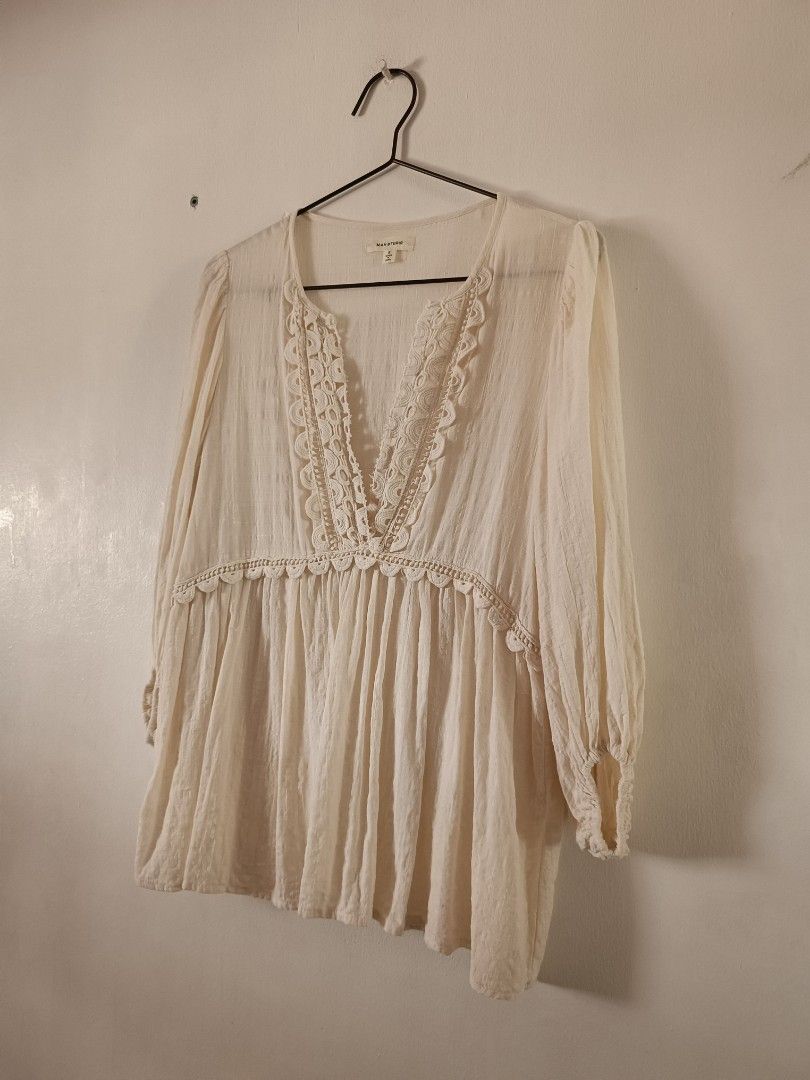 MAX Studio White Lace Trimmed Boho Tunic Blouse (Category: Blouses) located in Manila. Submitted by shajanina.14 (Listing ID 1460543380, Image 2). Description: MAX Studio Preloved Has unnoticeable flaws Small on the tag As per measuring tape, Bust- up to 38 inches Waist- up to 38 inches Length- 25 inches .
