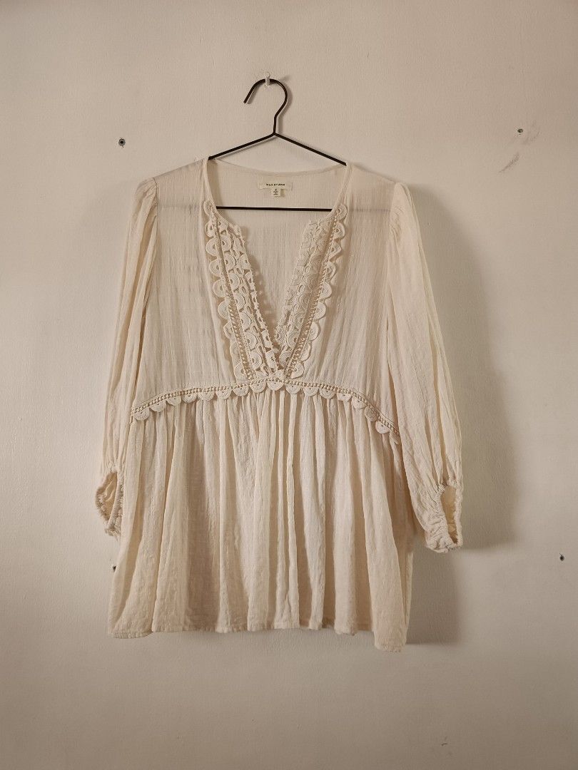 MAX Studio White Lace Trimmed Boho Tunic Blouse (Category: Blouses) located in Manila. Submitted by shajanina.14 (Listing ID 1460543380, Image 1). Description: MAX Studio Preloved Has unnoticeable flaws Small on the tag As per measuring tape, Bust- up to 38 inches Waist- up to 38 inches Length- 25 inches .