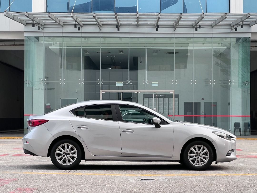 Mazda 3 Sedan 1.5 Standard (A) (Category: Used Cars) located in Singapore. Submitted by idealauto (Listing ID 1460648546, Image 3). Description: Features Fuel efficient 1.5L DOHC SkyActiv-G engine, smooth 6 speed auto transmission, 118bhp, ABS, 4 x airbags, multi function control steering. Accessories Sports rims, Sunroof, Factory fitted audio system with multi steering control/Bluetooth/AUX/USB, auto retractable side mirrors. Description Wear & 