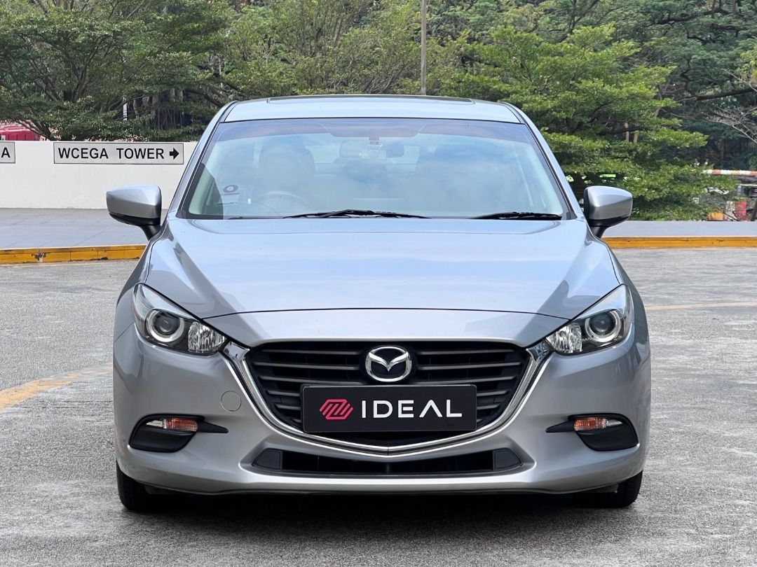 Mazda 3 Sedan 1.5 Standard (A) (Category: Used Cars) located in Singapore. Submitted by idealauto (Listing ID 1460648546, Image 2). Description: Features Fuel efficient 1.5L DOHC SkyActiv-G engine, smooth 6 speed auto transmission, 118bhp, ABS, 4 x airbags, multi function control steering. Accessories Sports rims, Sunroof, Factory fitted audio system with multi steering control/Bluetooth/AUX/USB, auto retractable side mirrors. Description Wear & 