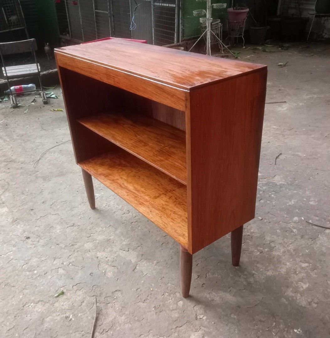 MCM Bookcase (Category: Shelves, Cabinets & Racks) located in Rizal. Submitted by mommykiee (Listing ID 1460511334, Image 3). Description: MCM bookcase Made of narra wood except legs tanguile wood Size: L34 W12 H31.5inch Stripped & varnished.