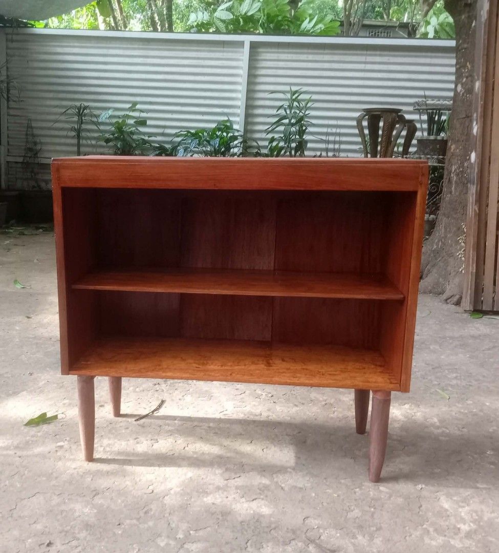 MCM Bookcase (Category: Shelves, Cabinets & Racks) located in Rizal. Submitted by mommykiee (Listing ID 1460511334, Image 1). Description: MCM bookcase Made of narra wood except legs tanguile wood Size: L34 W12 H31.5inch Stripped & varnished.