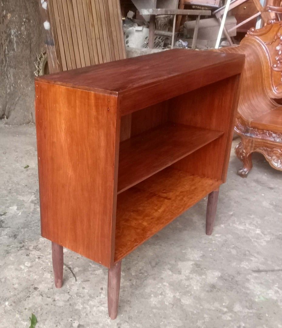 MCM Bookcase (Category: Shelves, Cabinets & Racks) located in Rizal. Submitted by mommykiee (Listing ID 1460511334, Image 2). Description: MCM bookcase Made of narra wood except legs tanguile wood Size: L34 W12 H31.5inch Stripped & varnished.