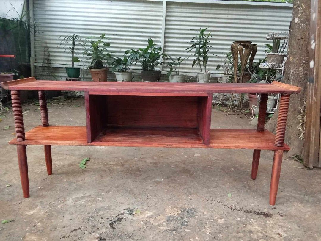 MCM TV Stand (Category: TV Consoles) located in Rizal. Submitted by mommykiee (Listing ID 1460512385, Image 1). Description: MCM TV stand Made of narra wood Size: L60 W13 H26inch Stripped & varnished.