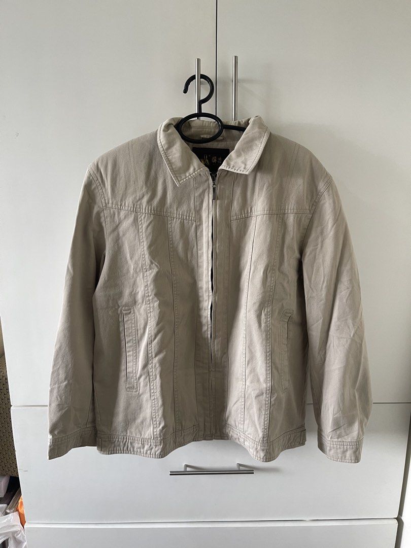 Men's Beige Casual Zip-Up Jacket (Category: Coats, Jackets and Outerwear) located in Makati City. Submitted by iannevllnv (Listing ID 1460664927, Image 1). Description: - Beige casual jacket - Zip-up front - Classic collar - Two side pockets - Sturdy cotton blend material - Ideal for everyday wear - Pairs well with jeans or chinos.