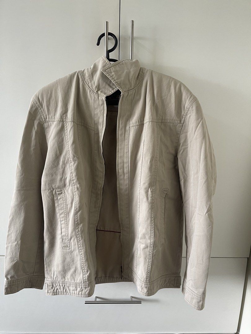 Men's Beige Casual Zip-Up Jacket (Category: Coats, Jackets and Outerwear) located in Makati City. Submitted by iannevllnv (Listing ID 1460664927, Image 2). Description: - Beige casual jacket - Zip-up front - Classic collar - Two side pockets - Sturdy cotton blend material - Ideal for everyday wear - Pairs well with jeans or chinos.
