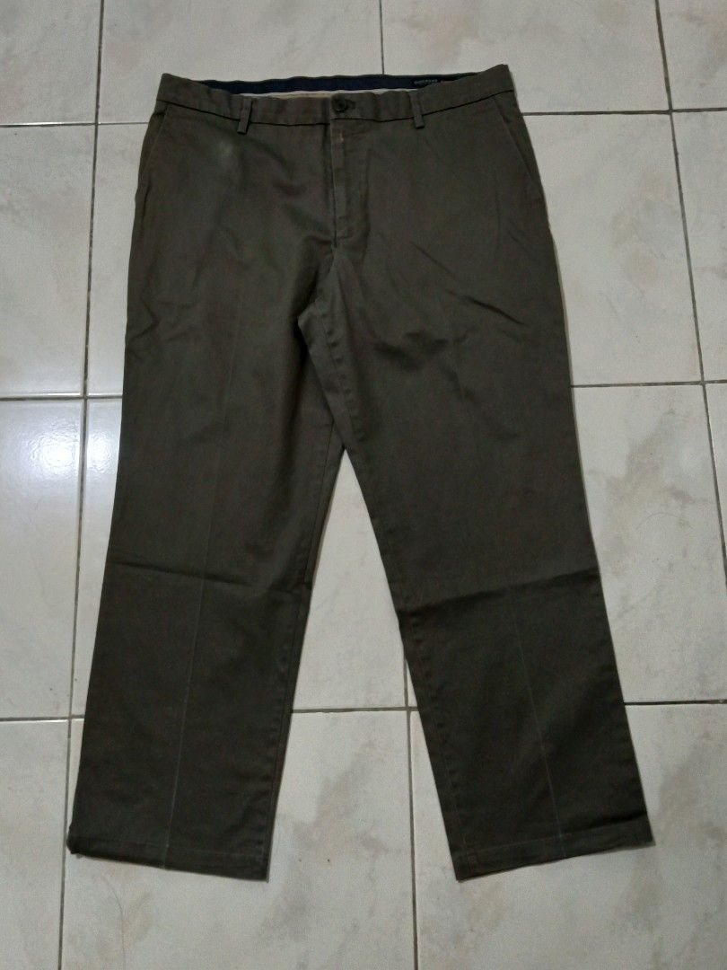 Men's Khaki Chinos Trousers (Category: Trousers) located in Manila. Submitted by nostalgic.curated (Listing ID 1460512953, Image 1). Description: - Classic khaki chinos for men - Straight leg fit - Two back pockets - Button and zip closure - Comfortable for everyday wear - Versatile for casual or smart casual outfits.