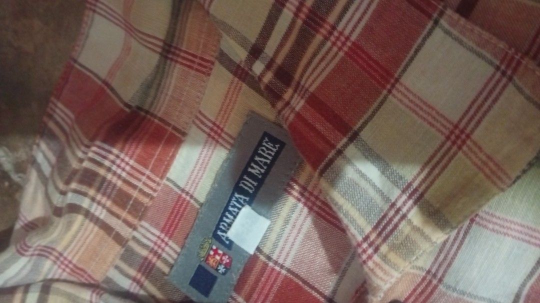 Men's Plaid Button-Up Shirt (Category: Tshirts & Polo Shirts ) located in Ubay. Submitted by pitipiww (Listing ID 1460528500, Image 2). Description: - Classic plaid pattern in red, beige, and white - Button-up front - Single chest pocket - Short sleeves - Ideal for casual wear.