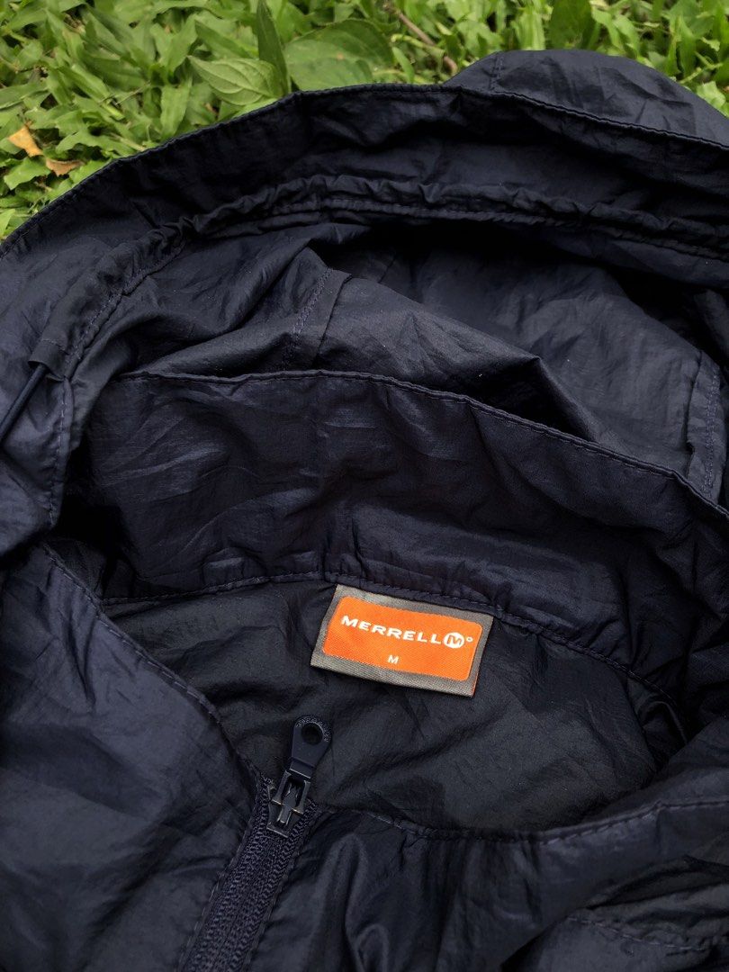 Merrell Lightweight Hooded Jacket (Category: Coats, Jackets and Outerwear) located in Kabasalan. Submitted by hamugaway (Listing ID 1460562657, Image 3). Description: - Navy blue Merrell jacket - Lightweight and packable design - Full zip front - Two front pockets - Hooded for extra protection - Perforated side details for breathability - Ideal for outdoor adventures or everyday wear - 19.5x26.5.
