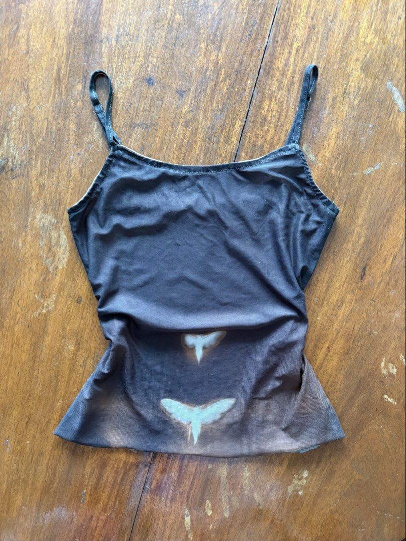 Mesh Graphic Sleeveless Top (Category: Sleeveless) located in Manila. Submitted by da.rrel.real (Listing ID 1460527871, Image 1). Description: ⋆˚꩜｡ details ⋆˚꩜｡ best fits : small issues : none but diy cut to make it a top color rate : 9/10 .✦ ݁˖ rules .✦ ݁˖ * no return / refund / exchange * you ask for more photos if you're SURE BUYER * shipping fee is shouldered by buyers unless stated otherwise (loc: Baguio City) love, darrel 𝜗𝜚⋆₊˚ .