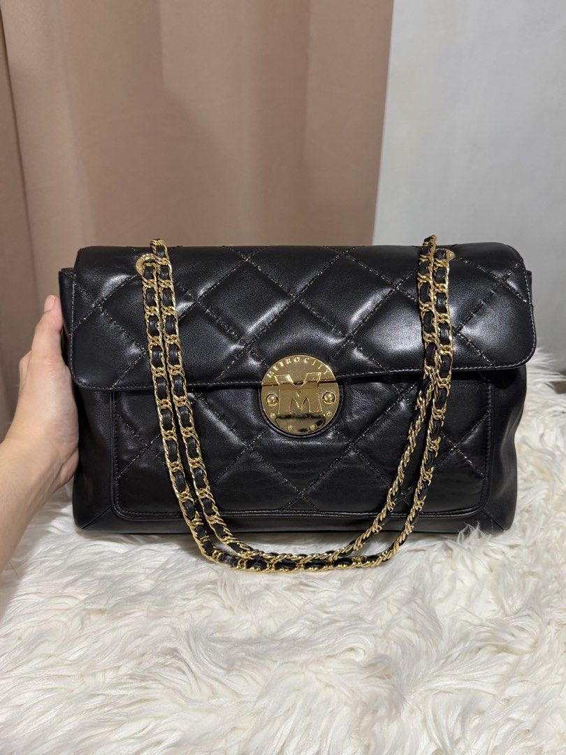 Metrocity Chain Sling Bag (Category: Shoulder Bags) located in Marikina City. Submitted by welllovedbycarina (Listing ID 1460544784, Image 3). Description: Original Metrocity, preowned from Korea Color is black, with glittered threads effect ✨ So pretty 😍 Gold tone hardware Ready to ship from Marikina City Medium Size Dimensions: (atleast) 30cm x 17cm x 11cm BAG CONDITION • Overall Condition: Excellent • Leather/Material: Excellent • Corners & E