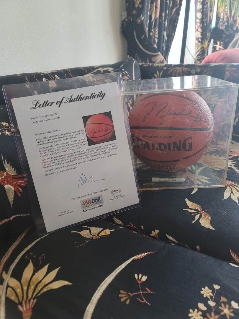 Michael Jordan Signed Spalding Basketball with PSA DNA Authentication (Category: Racket and Ball Sports) located in Davao. Submitted by gretchenal19856 (Listing ID 1460608608, Image 1). Description: - Authentic Michael Jordan signed Spalding basketball - Includes Letter of Authenticity from PSA/DNA (dated Nov 29, 2022) - Certification Number: A106741 - Signature authenticated by PSA/DNA - Displayed in a clear acrylic case - Perfect collectible fo