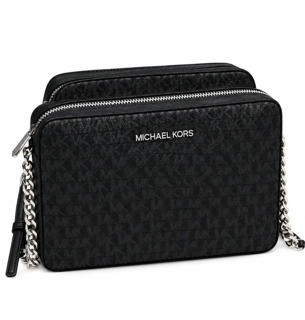 Michael Kors Black Monogram Chain Crossbody Bag (Category: Luxury Bags & Wallets) located in Valenzuela. Submitted by noldmac (Listing ID 1460533060, Image 1). Description: - Authentic Michael Kors crossbody bag in black. - Features the iconic all-over MK monogram print. - Elegant silver chain strap, can also be worn as a shoulder bag. - Secure zipper closure for your belongings. - Two main compartments for organized storage. - Ideal for everyday