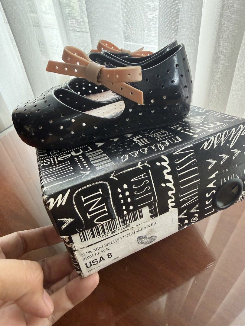 Mini Melissa (Category: Babies & Kids Fashion) located in Las Pinas. Submitted by karensalingarog (Listing ID 1460554955, Image 2). Description: - Mini Melissa Black Jelly Mary Jane Shoes - Size US 8 - Adorable perforated design - Sweet bow detail on strap - Comes with original box - Proudly made in Brazil.