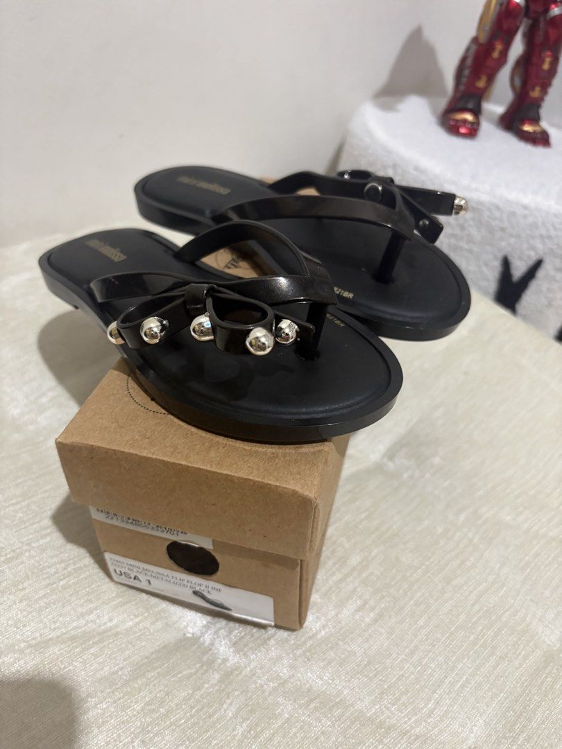 Mini Melissa Flip Flops Black Bow Detail Size 1 (Category: Babies & Kids Fashion) located in Bacoor. Submitted by merylcb (Listing ID 1460641210, Image 2). Description: US 1 Brand new - Black Mini Melissa flip flops - Features a cute bow detail with silver studs on the strap - Made of jelly material, easy to clean - Includes original box - Ideal for casual wear.