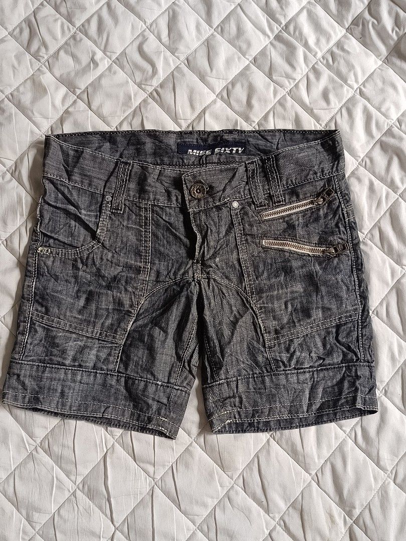 Miss Sixty Denim Shorts Size 26 (Category: Shorts) located in Cebu City. Submitted by vionchan (Listing ID 1460552488, Image 1). Description: - Miss Sixty Denim Shorts - Size: 26-30 - Color: Dark Wash - Details: White stitching, zippered front pockets - Closure: Button and zip - Material: 100% Cotton - Style: Casual wear.