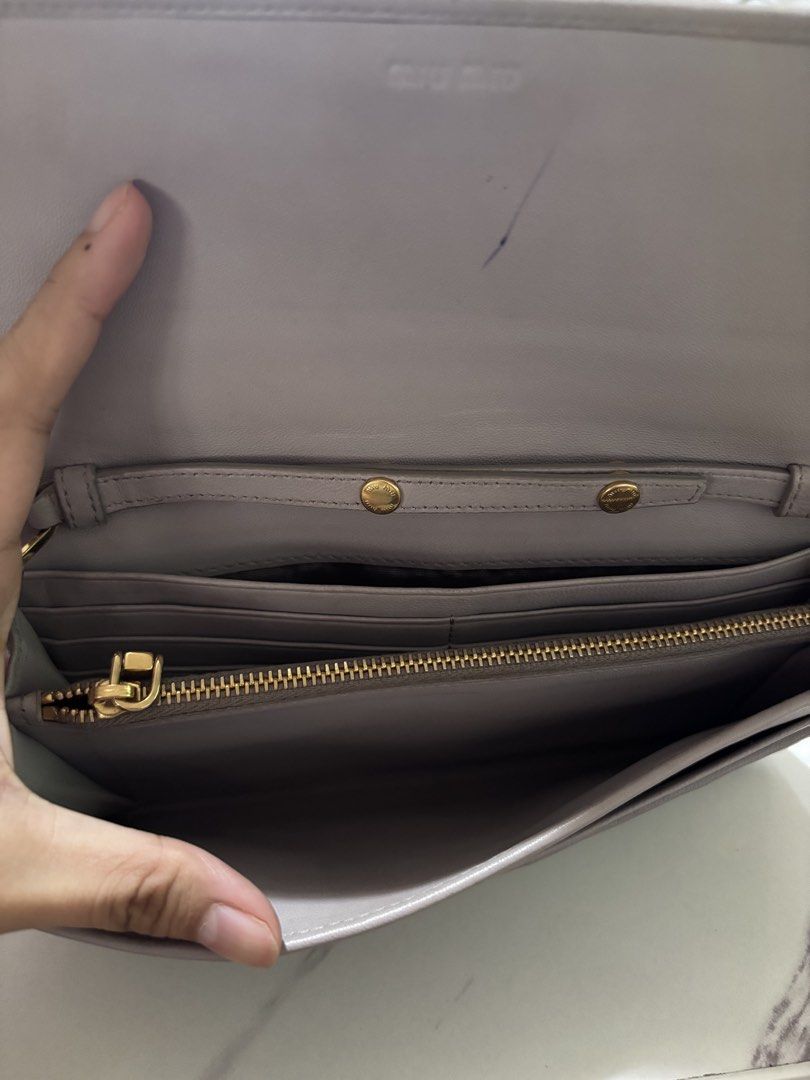 Miu miu wallet on chain (Category: Luxury Bags & Wallets) located in Dagupan City. Submitted by raregrail.co (Listing ID 1460628722, Image 2). Description: .
