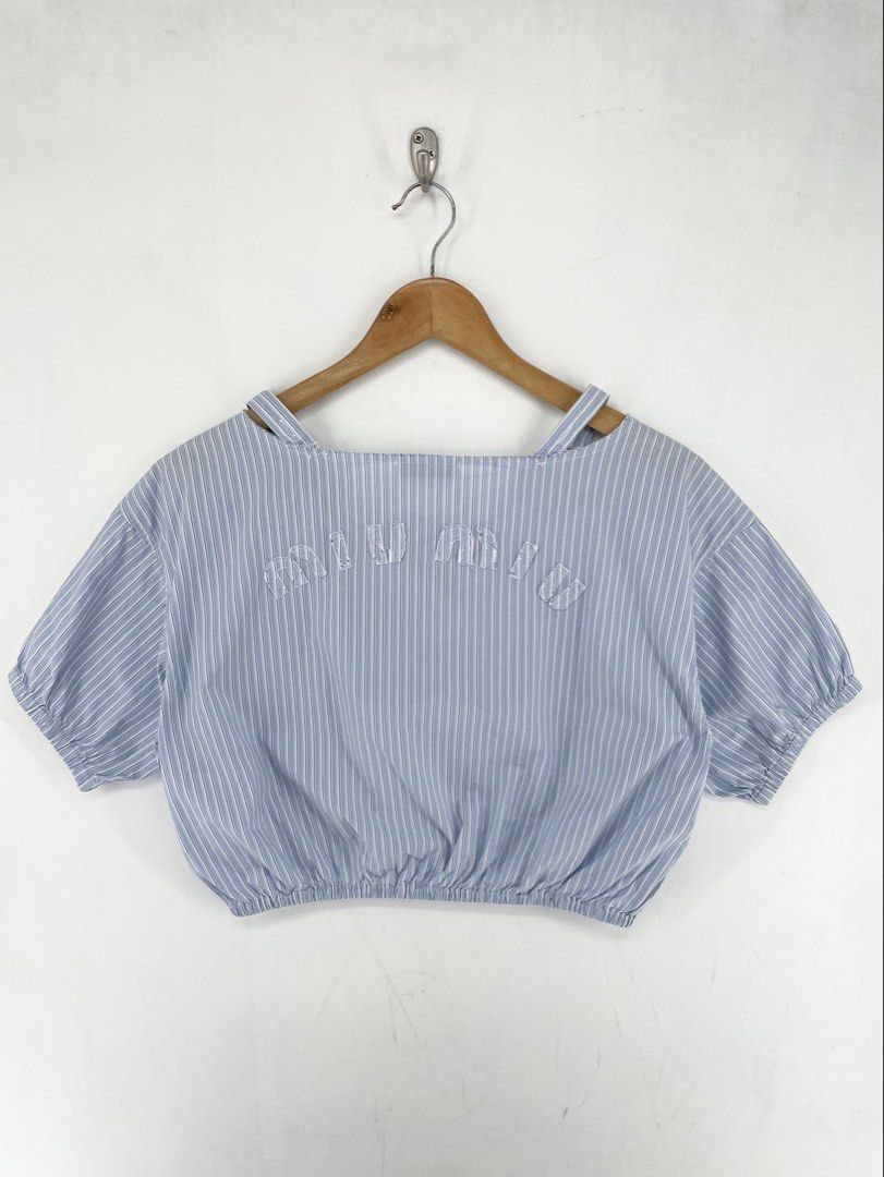 Miumiu Chrambray Stripe Distressed Crop Top (Category: Blouses) located in Mandaluyong City. Submitted by armrhts (Listing ID 1460618034, Image 2). Description: Size: Medium Dimensions(inches) •Width: 21" •Length: 15" •Pit to Cuff: 6".