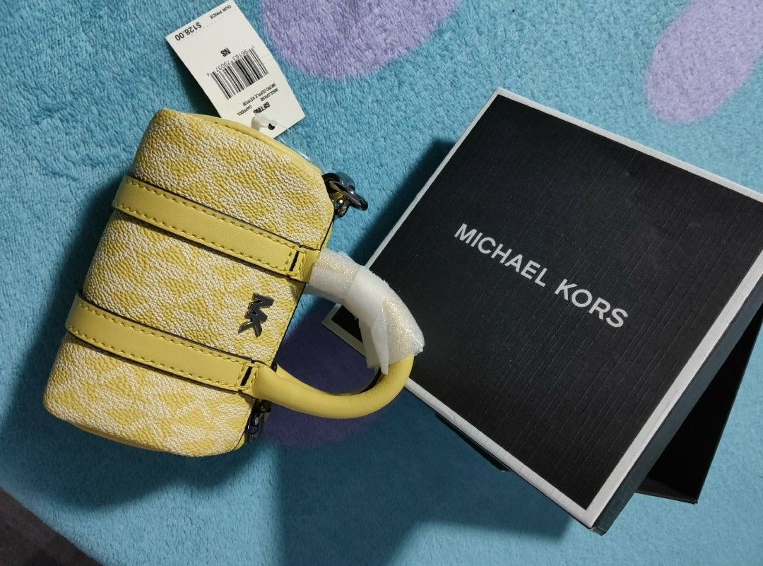 MK keyfob (Category: Purses & Pouches) located in Rizal. Submitted by annlj (Listing ID 1460543766, Image 3). Description: Mini Michael Kors Charm.
