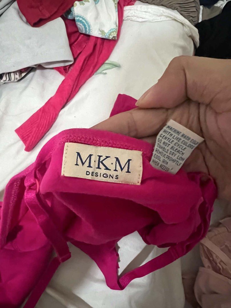 MKM Designs Pink Ruffled V-Neck Tank Top (Category: Sleeveless) located in Oroquieta. Submitted by zjstg (Listing ID 1460642473, Image 3). Description: - Pink V-neck tank top - Brand: MKM Designs - Features ruffled trim - Spaghetti straps - Comfortable and casual style - Ideal for layering or wearing alone - Pairs well with shorts or jeans -Dimensions Ptp: 15” Length: 22 Excellent/No issue 200+sf.