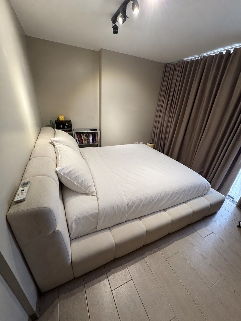 Modern Upholstered Platform Bed Frame with Headboard (Category: Bed Frames & Mattresses) located in Quezon City. Submitted by rehms (Listing ID 1460681628, Image 2). Description: Barely Used Custom-Made King-Size Upholstered Bed Frame - Custom-made by Bedworks PH - Bought for ₱45,000, Used for 1 year only. - King size: 72” × 78” - Made with kiln-dried mahogany wood and marine plywood - Thick Uratex foam padding around the headboard, sides, and fo