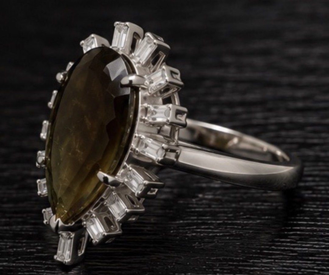 Moldavite (Category: Rings) located in Quezon City. Submitted by chelle2923 (Listing ID 1460664636, Image 3). Description: A breathtaking 3.50 ct Natural Moldavite, expertly fashioned in a stunning Pear-Shaped Step Cut and set in 925 Sterling Silver, accented with brilliant Baguette-Cut Diamonds. 💚✨ 📜 GIT Thailand Certified 💎 Natural Glass (Moldavite) 💚 Yellowish Green 💎 3.50 ct ✨ Pear Shape | Step Cut 🤍 925 Sterling Silver Setting 💎 Bague