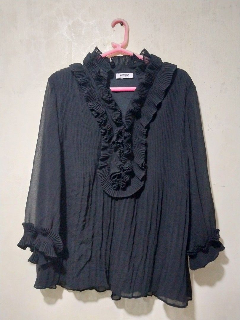 Moschino Black Pleated Ruffle Sheer Blouse (Category: Blouses) located in Manila. Submitted by PrinceDani.Clothing (Listing ID 1460563848, Image 1). Description: moschino black pleated ruffles sheer medium 18.5in width 24in length excellent condition .