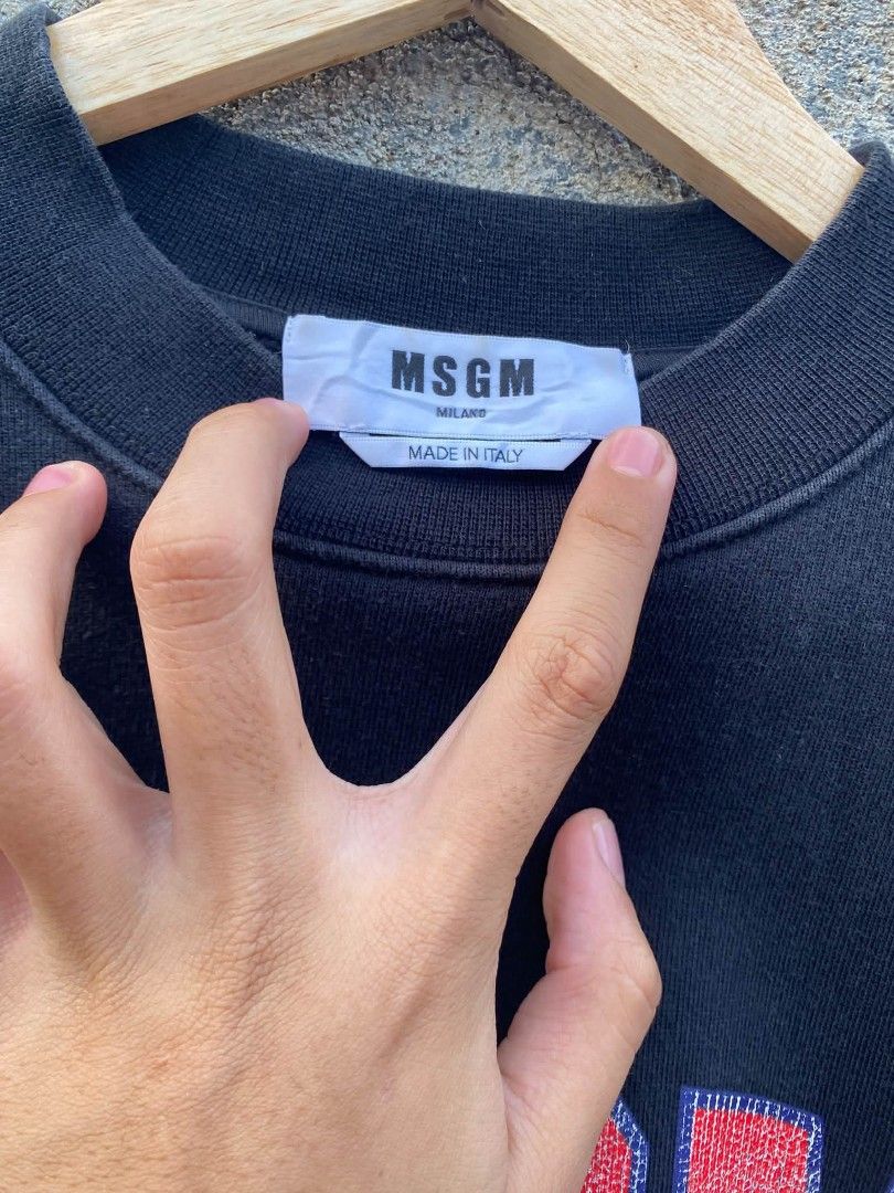 MSGM Black Sweatshirt with Cat Graphic - Size M (Category: Coats, Jackets and Outerwear) located in Bansalan. Submitted by thriftyzzz (Listing ID 1460683407, Image 3). Description: - Black MSGM sweatshirt - Features iconic MSGM logo with distressed cat graphic - Made in Italy - Tag size: M - Ideal for casual wear.