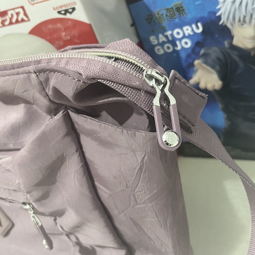 Muted Purple Kipling Inspired Cross Body Bag (Category: Cross-body Bags) located in Paranaque City. Submitted by songel.co (Listing ID 1460603812, Image 3). Description: Muted Purple Kipling Inspired Cross Body Bag No noticeable defects Signs of usage can only be seen on the seams near the strap (see pictures) Manage expectations Bought in Singapore Loc: Sun Valley Parañaque Mod: J&T / Lalamove Mop: Gcash / BDO .