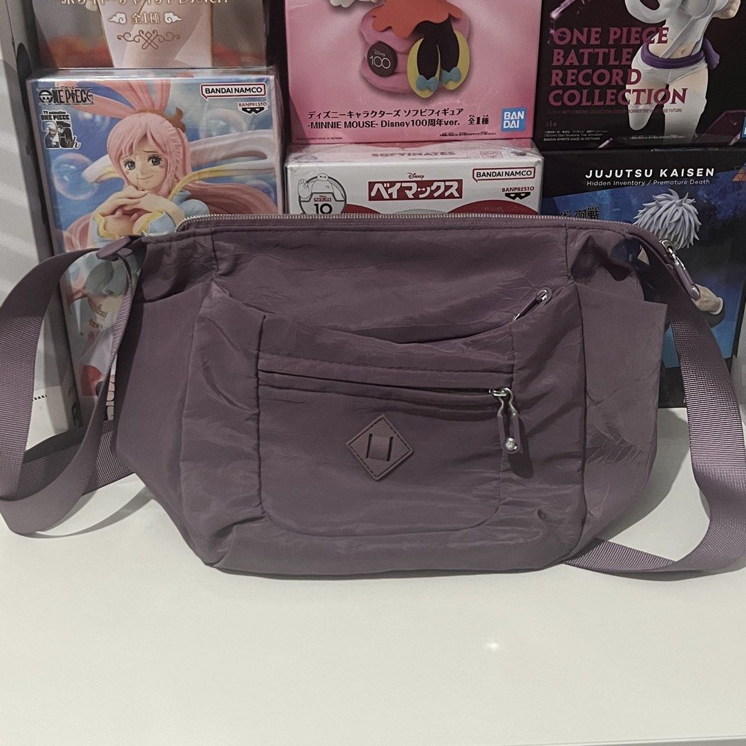 Muted Purple Kipling Inspired Cross Body Bag (Category: Cross-body Bags) located in Paranaque City. Submitted by songel.co (Listing ID 1460603812, Image 1). Description: Muted Purple Kipling Inspired Cross Body Bag No noticeable defects Signs of usage can only be seen on the seams near the strap (see pictures) Manage expectations Bought in Singapore Loc: Sun Valley Parañaque Mod: J&T / Lalamove Mop: Gcash / BDO .