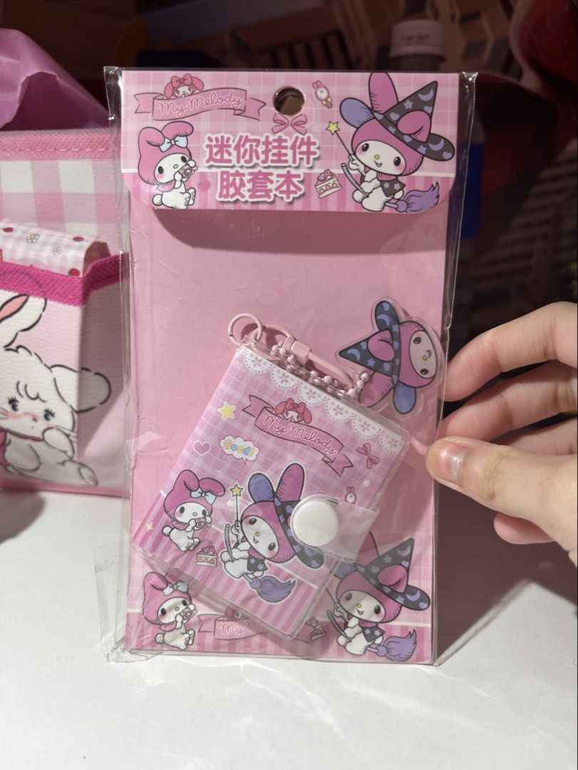 My Melody Mini Keychain Notebook (Category: Character Goods) located in Cavite. Submitted by leiluvsu (Listing ID 1460559588, Image 1). Description: - Adorable My Melody Notebook Keychain - Features My Melody dressed as a witch. - Ideal for storing small essentials or as a charming accessory. - A must-have for any My Melody enthusiast!.