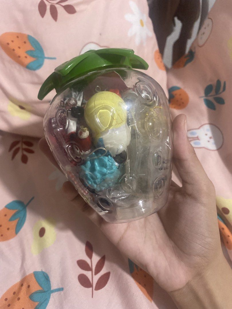Mystery Trinket Jar! 🍓✨ (Category: Handmade Craft) located in Taguig. Submitted by declutterwkeish (Listing ID 1460681480, Image 2). Description: 🧚‍♀️ Inclusion: - Freebies - Strawberry Jar - Trinkets ₱250 ALL IN Mystery so expect na assorted yung trinkets. But all in great condition !.